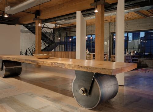 The movable table, inspired by the work of George Nakashima, was center-cut from an old-growth tree that died naturally and retains the tree’s contours.