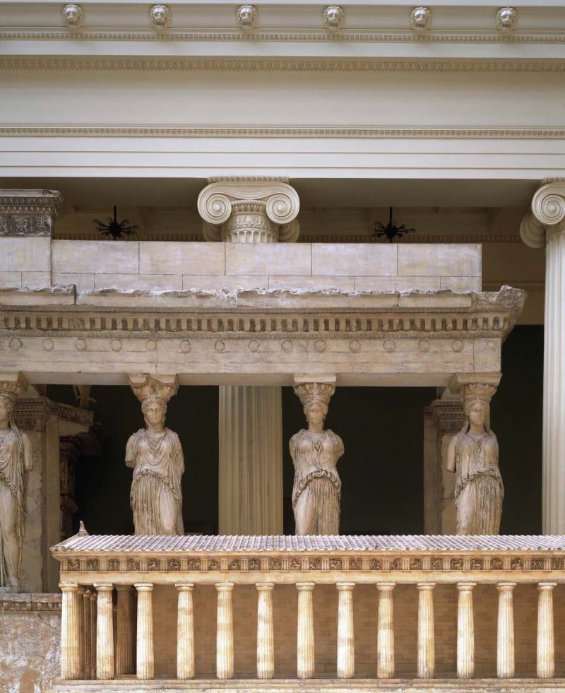 Receding façades: In the Carnegie's Hall of Architecture, a model of the Parthenon sits in front of a plaster cast of the Porch of the Caryatids from the Erechtheum, a temple on the Acropolis in Athens, Greece.