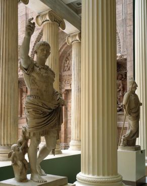 Sculpture casts from the Hall of Architecture: the famous Augustus of Prima Porta (c. 15 B.C.), with the goddess Athena in the background. 