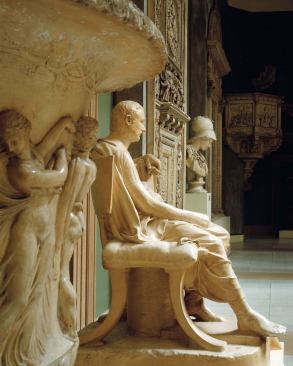 The comic playwright Menander (c. third century B.C.) beside a copy of the Borghese Vase, c. 40 B.C.