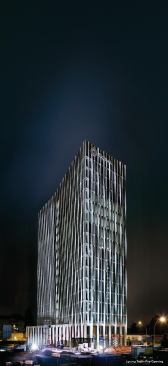 Tour Total exterior, at night.