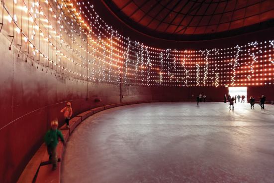 The interior is ringed with 1,280 2700K white LEDs, mounted in alignment with the 2,012 surface cutouts (the number commemorates the installation year).