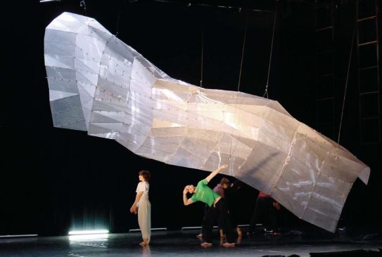 California: Stage set for John Jasperse - The 25-foot-long set, suspended from overhead rigging, consisted of a three-dimensional canopy that hovered and dipped over the stage.