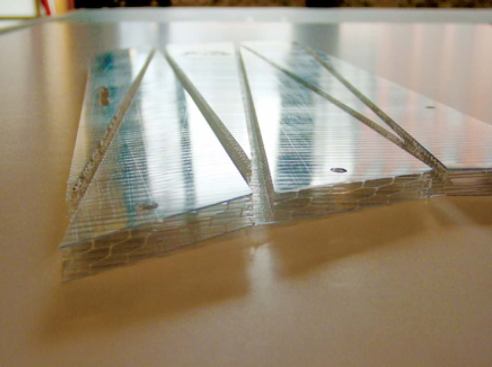 California: Stage set for John Jasperse - This detail drawing of the polycarbonate material shows the result after routing. One surface of the sheet remains intact to act as a hinge.