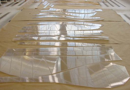 Pleats Please, Issey Miyake, Berlin - After the milling process, individual sections were laid out on the factory floor. For high-end projects such as the Miyake showrooms, Eloueini favors a 12mm-thick panel for its strength and structural rigidity.