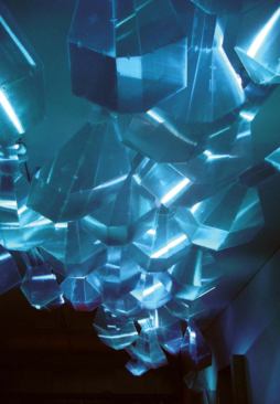 Nubik, Grand Arts Gallery, Kansas City - At opening night festivities, a crowd gathered beneath the installation, which glowed in blue light.