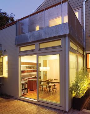 In architect Neal Schwartz’s new plan, “you don’t really see the functioning kitchen until you enter the kitchen itself,” he says. 