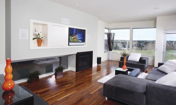 A second- floor main living space yields dramatic views of the Rocky Mountains.