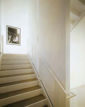 Elliott treated the hallway and the stairwells as a suite of linear and vertical galleries.