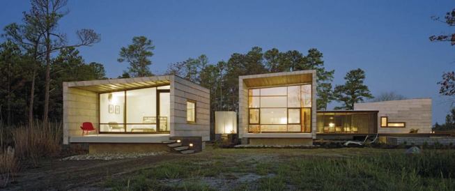 At dusk, the etched glass-enclosed shower becomes an oversized outdoor lantern.