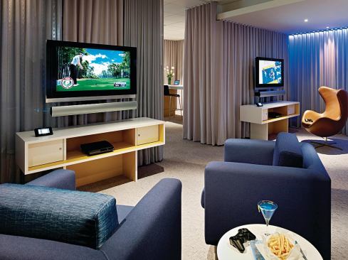 Intersect: A Fairmont Media Lounge

San Francisco



Freebairn-Smith & Crane

This 2,400-square-foot lounge in the Fairmont San Francisco occupies space once used for hotel offices. It has gaming stations, an interactive media table, and a 40-person-capacity screening room with an LCD projector.