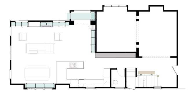 The home’s first-floor plan shows the bookshelves’ multiple locations.