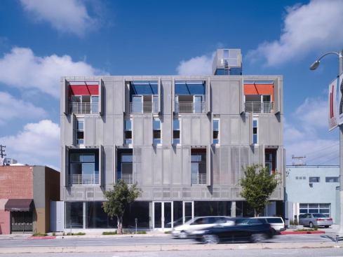 Residents of the Lofts at Cherokee Studios can change the building's exterior appearance by opening or closing their units' perforated metal screens.