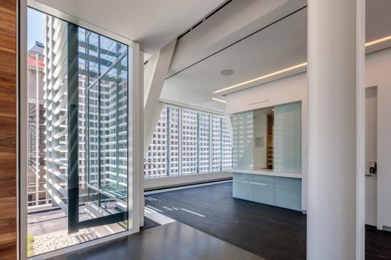 Horizontal louvers mitigate direct sun exposure.