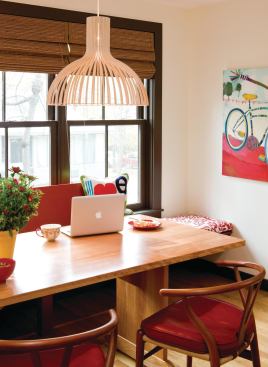 The kitchen also features universal touches, such as the custom-made table for wheelchair seating in the breakfast nook.