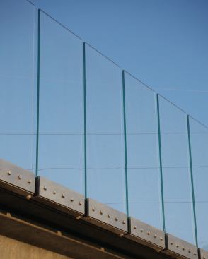 Glass panels in lieu of typical handrails allow for uninterrupted views.