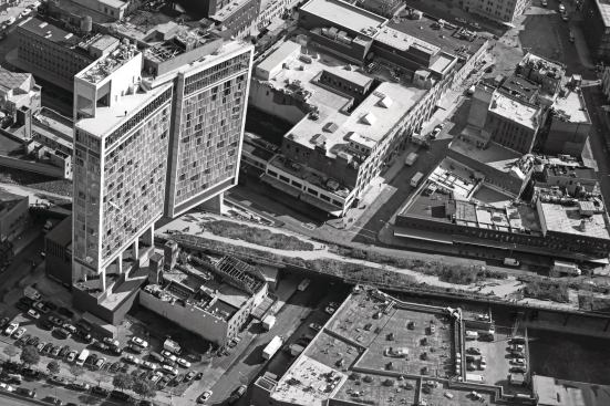 Ennead Architects used sculptural piers to design the Standard Hotel above the High Line, which runs underneath the building. 