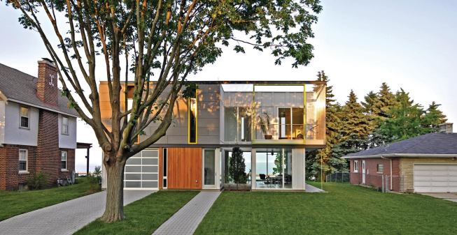 Despite its abundant glazing, the home employs a ventilated rainscreen and soy-based spray foam insulation to achieve high-performance values.