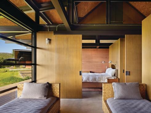 "We tried to use very simple, natural materials that don't over-indulge," says Tom Kundig, FAIA, about the project's palette of wood, rammed-earth, metal, and concrete.