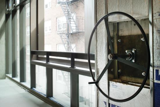 A construction shot of one of the hand wheels.