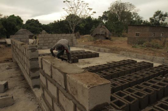 The walls are concrete block formed on site with block moulds (mixture of locally sourced Chilanga cement and river sand).