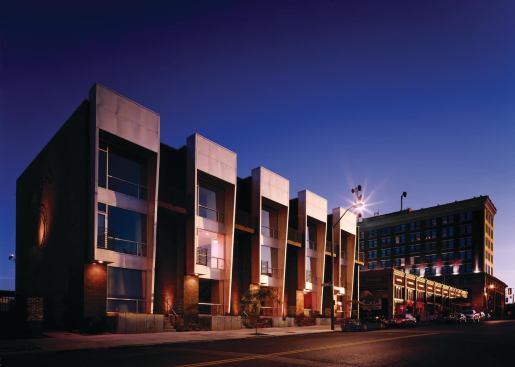 Scale and mass helped these five modern townhomes play nice with the existing structures in a Memphis arts district.