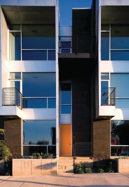 Each townhome has a private balcony that addresses the street.