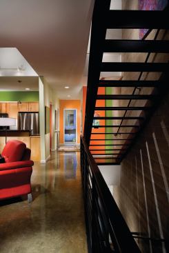 The units feature open plans and waxed concrete floors.
