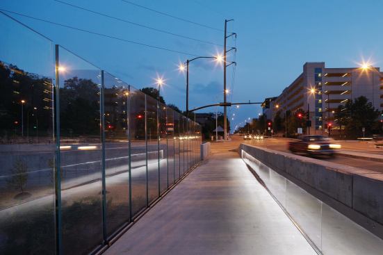 Lighting  is integrated into the structure forthe  pedestrian walkway. 