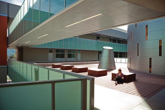 Inside the building's triangular form, a large courtyard creates casual touchdown spaces.
