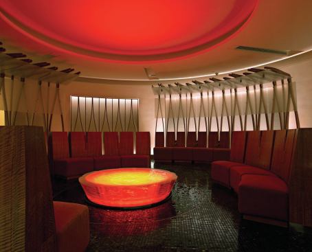 CBBLD also outfitted the room’s ceiling coves and walls with linear RGB LEDs. This allows the color of the entire space to subtly shift from red... 