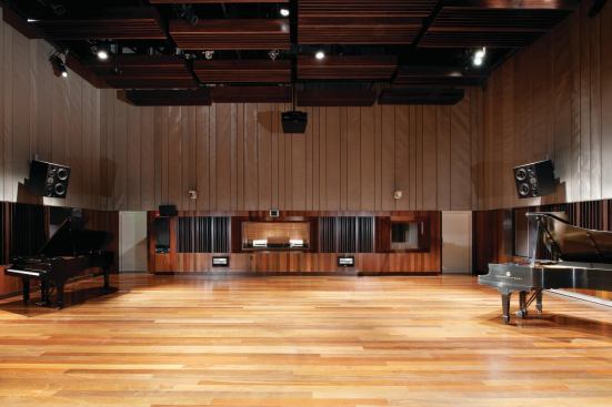 The recording studio located on the south end of the building is the most acoustically sensitive room in the building. To isolate the room from the rest of the facility, the walls are a massive 4 feet, 1 inch thick. The ceiling has to protect the studio from airplane noise and vibrations, because the building is on the flight path to the Cleveland airport. The green roof directly above the studio adds extra mass that helps block the roar of 747s passing overhead.