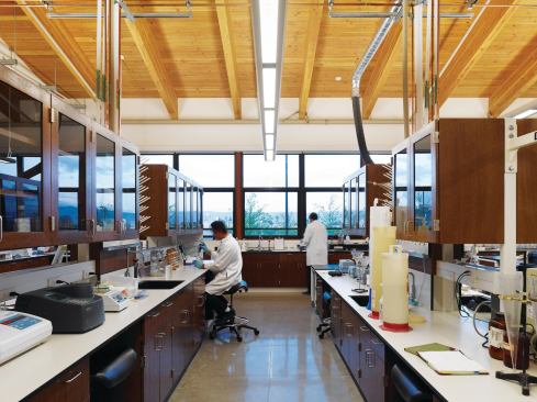 In the water-testing lab, high-efficiency mechanical equipment provides the services needed by a traditionally power-hungry setting without blowing the energy budget. Occupancy sensors ensure that the lights are off whenever the lab is empty.