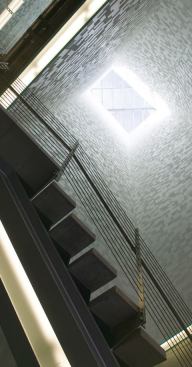 The light shafts allow natural light to permeate throughout the building while creating unique effects.
