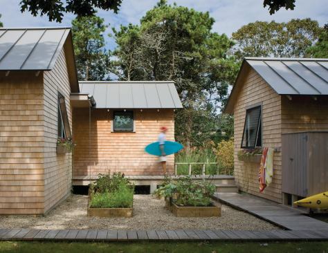 Architect James Estes carved out spaces for greenery in between the project's four small buildings.