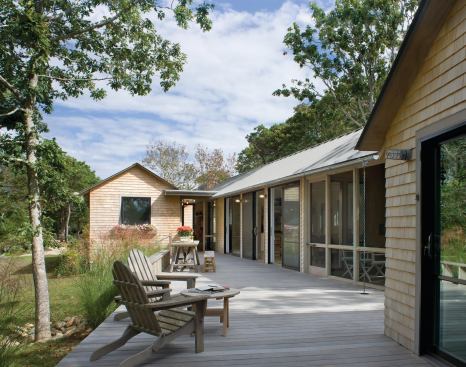 At the heart of the compound, the boardwalk becomes more of a porch adjoining the main house.