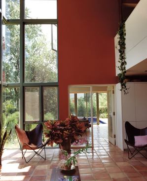 Harmon’s own residence in Raleigh, N.C., is full of glass that opens to views of a rich, urban garden.