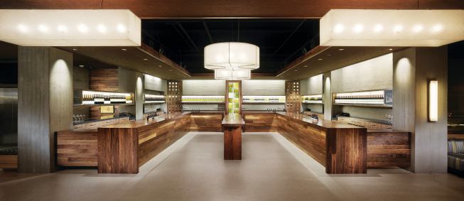 A new take on the wine bar, Press Club--in the base of the Four Seasons Hotel in San Francisco--plays host to eight local wineries at different stations on the two main horseshoe bars (one of which can be seen above) in an industry-meets-nature-inspired setting.