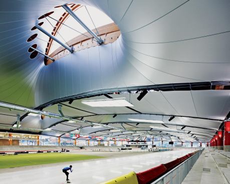 The Aicher Arena uses a highly reflective, low-emissivity membrane fabric to encase roof trusses and help regulate temperature and humidity conditions inside the arena.