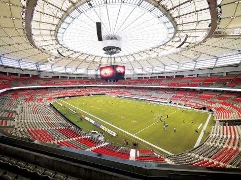 The membrane fabric roof over BC Place in Vancouver, Canada, is the world’s largest cable-supported, retractable roof to date. Measuring the same size as the playing field, the nominally 100-meter-by-85-meter 

roof comprises two layers 

of PTFE fabric that form a membrane cushion.