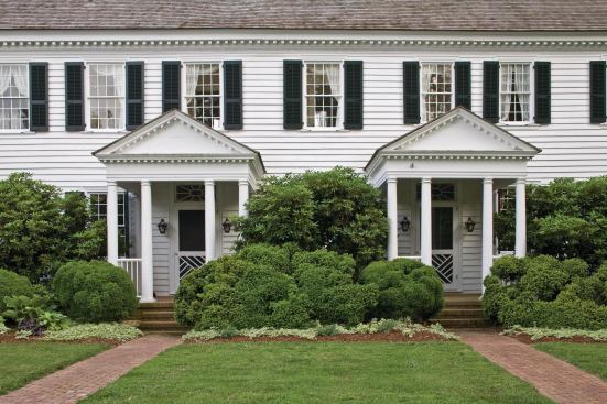 Part of the process involved restoring the twin entry porches on the home's front facade.