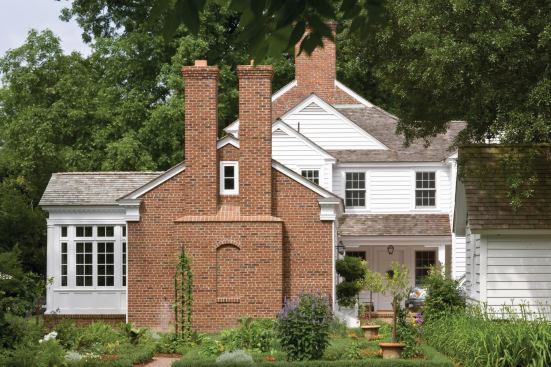 The newly added kitchen and breakfast room maintain a modest scale in deference to the main house. 