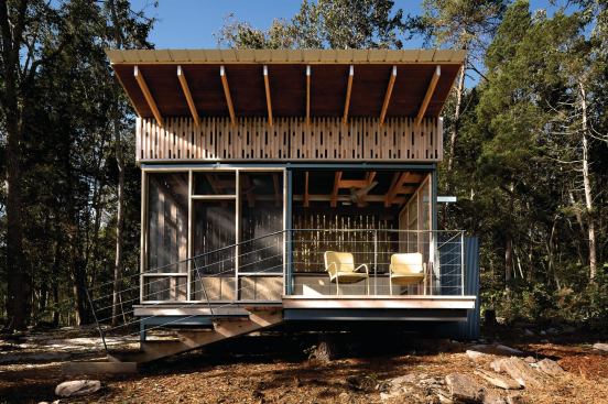 Walls of spaced cedar 2x4s were shop fabricated and trucked to the site for quick assembly.

