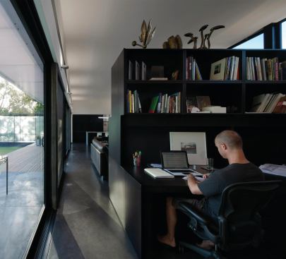 The live/work pavilion houses the owners' three-person architecture studio.