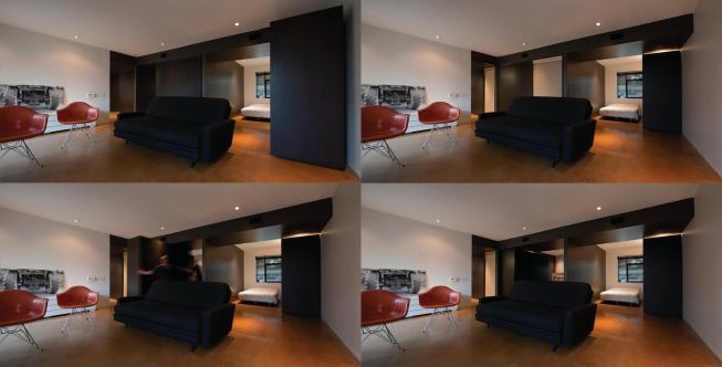 Wheeled millwork components move to create a variety of indoor configurations. Here a wardrobe shifts to incorporate a bedroom into the playroom of the remodeled ranch house. 

