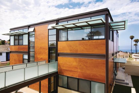 A view terrace above the garage connects back to the main house via a glass bridge crossing over the courtyard.