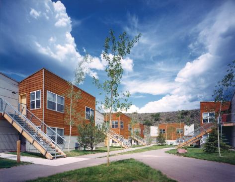 Completed in 2000, the Burlingame affordable housing development comprises four housing clusters and a commons building.