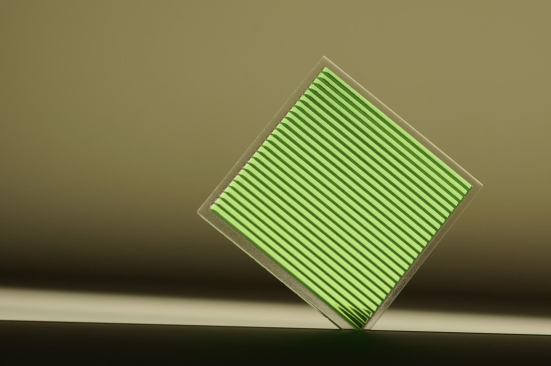 Luxexcel can digitally design and print prisms, such as this green linear prism, to facilitate the refraction of an LED light source.