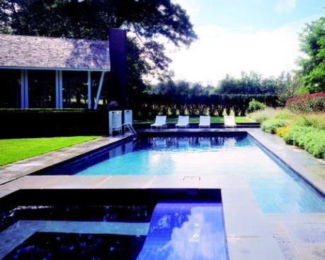 Custom Home Outdoors – Fall 2006  Architect: Audrey Matlock Architect, New York; Builder: KP Dutcher, Watermill, N.Y.   A 700-square-foot pavilion is the focus of several outdoor spaces and landscaped areas within this Long Island, N.Y., acreage. The airy destination draws people out of the house into a protected yet open-air room that accommodates all manner of activities. “Its purpose was to provide space for dining or entertaining,” architect Audrey Matlock explains, “while engaging the house visually and experientially with the landscape.”