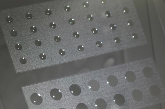 Printed on a matte surface texture, this array of plano convex lenses by Luxexcel helps collimate light from LEDs. 